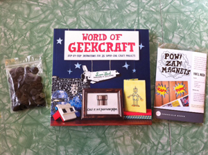 World of Geekcraft, Pow! Zap! magnet kit, and Coraline buttons